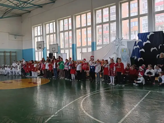 uczniowie wykonują utwór świateczny językiem migowym