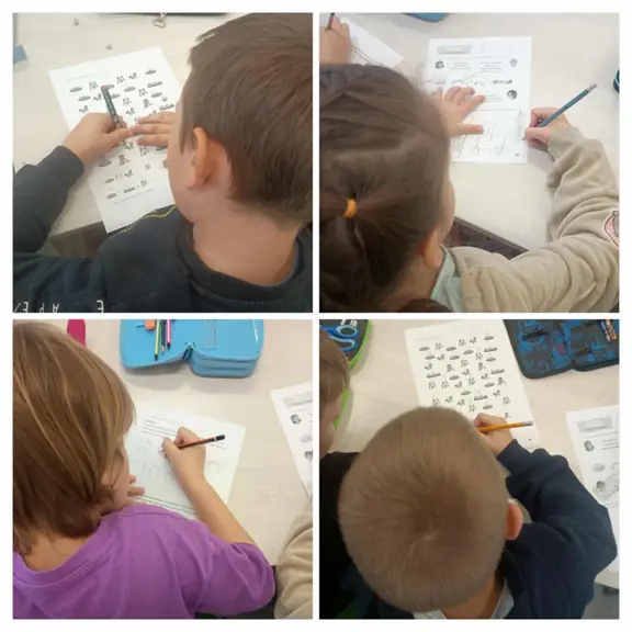 Uczniowie klasy drugiej a rozwiązują zadania matematyczne